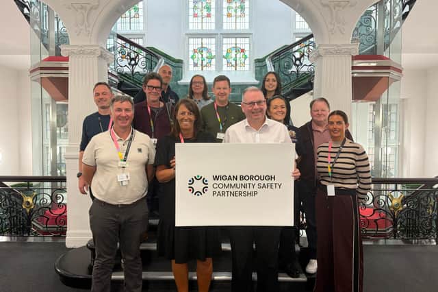 Julie Middlehurst, assistant director infrastructure and regulatory services and chair of Wigan Borough Community Safety Partnership, centre, with other members of the partnership