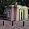 I love the lighting at the plantation gates.