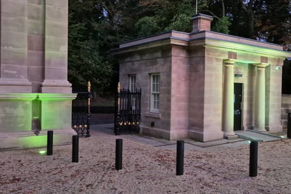 I love the lighting at the plantation gates.
