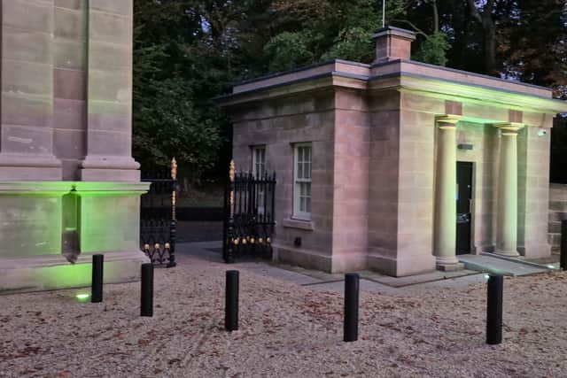 I love the lighting at the plantation gates.