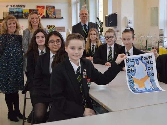 Pupils with their artwork