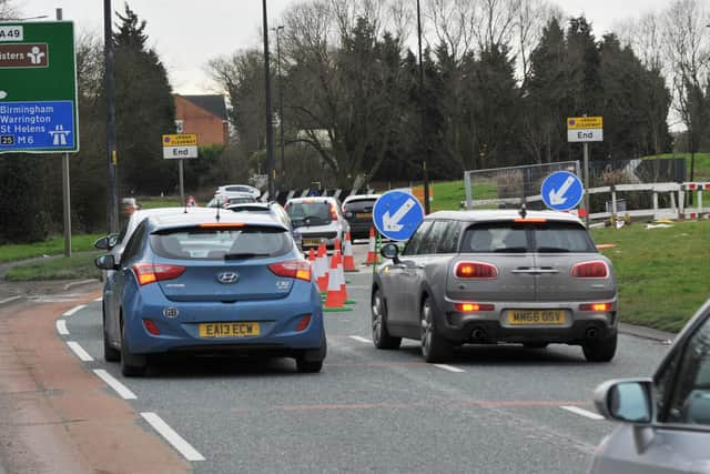 Roadworks on the dual carriageway near the roundabout on Warrington Road, Marus Bridge, Wigan, causing traffic because one lane is closed