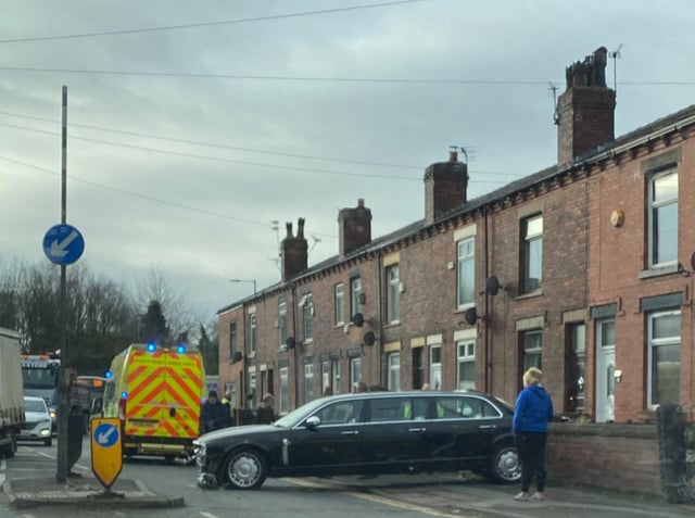 The funeral limousine hit a garden wall on Warrington Road, Lower Ince