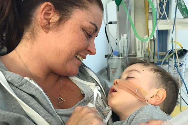 Wigan mum Clare Prendergast with son Mason following his cardiac arrest