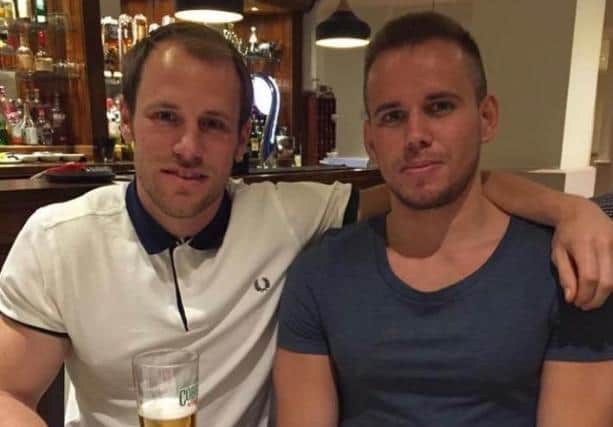 Sam Robinson (left) will be running 26.2 miles in tribute to his brother George (right), who died in 2018