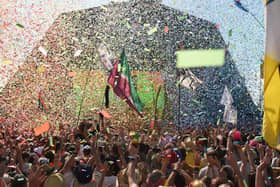 Revellers cheer as Australian singer Kylie performs at the Glastonbury Festival in 2019