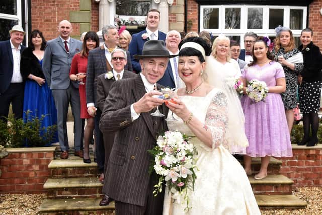 Lisa Lane and Peter Baker celebrate their marriage with guests