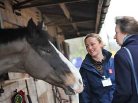 Carrie Byrom shows The Princess Royal around the Parbod stables during a recent visit