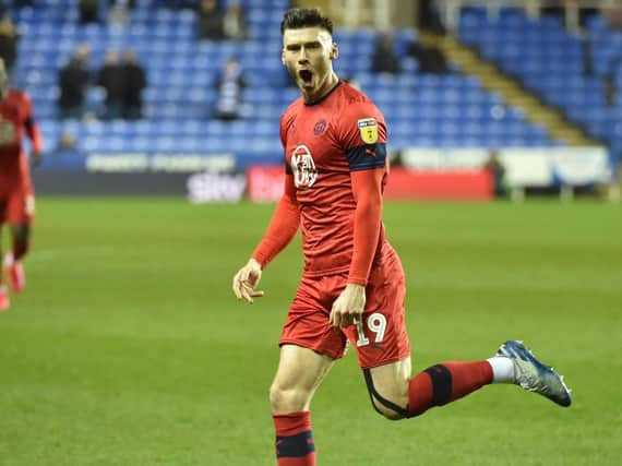 Kieffer Moore celebrates his cracking goal at Reading