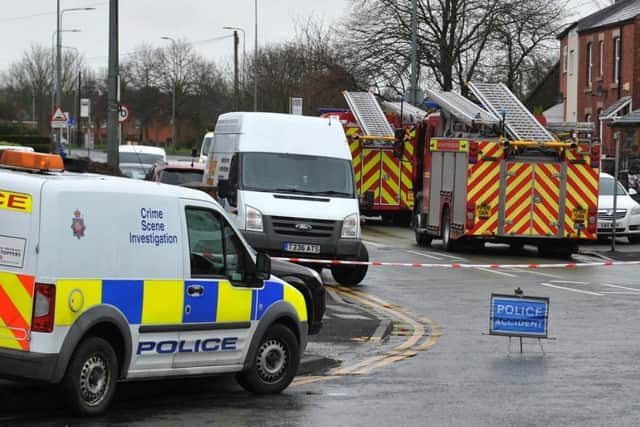 Police and Greater Manchester Fire and Rescue at the scene of a fire, Marsh Green