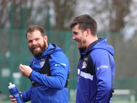 Joe Greenwood with Adam Cuthbertson in training