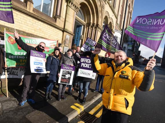 Paul Almond, right, on the picket line with his colleagues