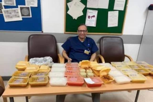 Staff at Wigan Infirmary with their food from Taz Mahal. Image: Sharon Crank