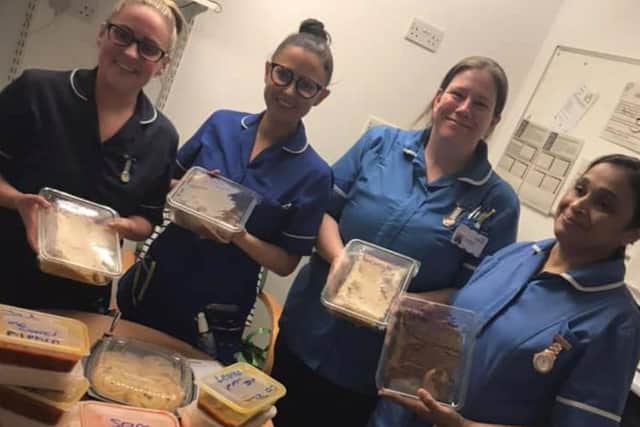 Staff at Wigan Infirmary with their food from Taz Mahal. Image: Sharon Crank