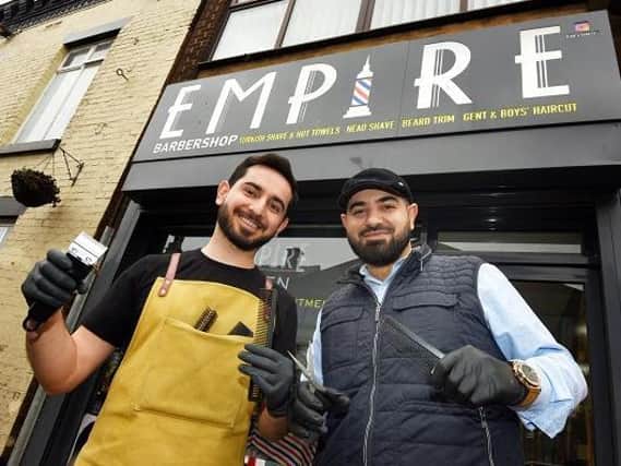Kaya Khoshnaw and cousin Razhan (also known as Martin) Khoshnaw at Empire barber shop
