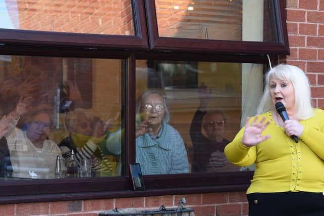 Pat Masterson entertains residents at Ambleside Care Home
