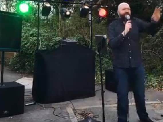 Neil Makinson performing on his driveway