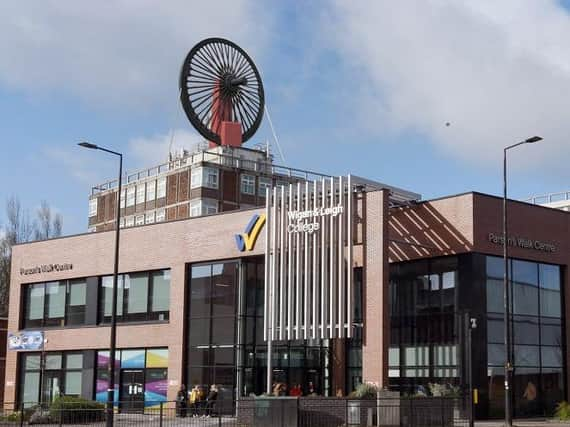 How the wheel will look on top of the college's roof