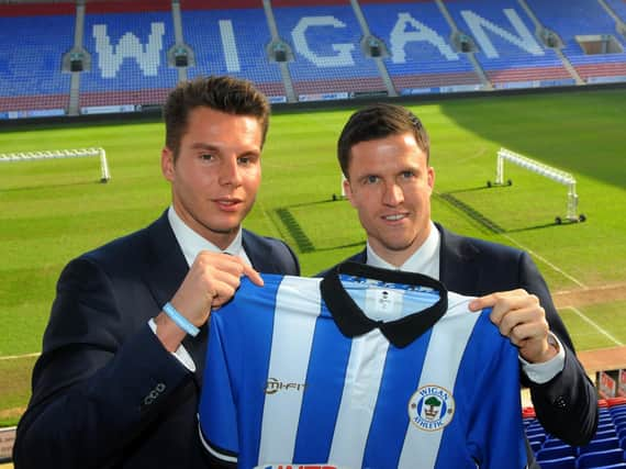 David Sharpe and Gary Caldwell in 2015