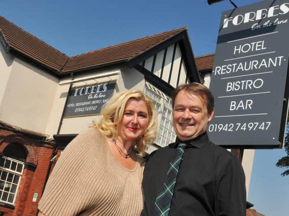 Praised: From the left, Rene Heyes and Russell Jervis owners of new bar and restaurant, Forbes on the Lane, Wigan Lane