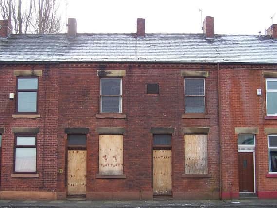 The number of empty houses in Wigan has reduced by 35 per cent in a year