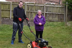 Coun Steve Jones  pictured with Bryn resident Jacqueline Hodson