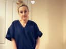 Charlotte Mack in one of the scrubs she has made