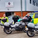 Second left  MCO Service Manager Rod Gaskell delivers the bikes , charity boss Dan Lavery,  second right