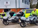 Second left  MCO Service Manager Rod Gaskell delivers the bikes , charity boss Dan Lavery,  second right