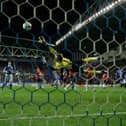 Shaun Maloney sends the winning goal into the top corner of David de Gea's net