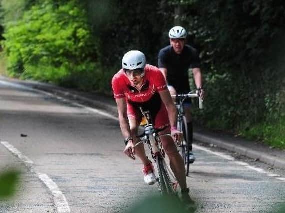 Cyclists riding through Standish in a previous race