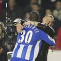 Paul Jewell congratulates Jason Roberts, whose late goal at Arsenal sent Latics to the Carling Cup final in 2005/06 - a popular pick among our 12th Man panel for 'best season ever'