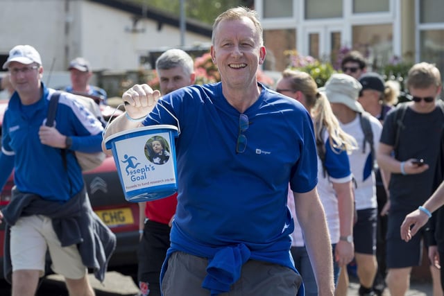 Around 100 fans walked from Wigan to Fleetwood to raise money for Joseph's Goal.