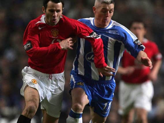 Graham Kavanagh playing for Latics against Ryan Giggs and Manchester United in the 2006 Carling Cup final in Cardiff.