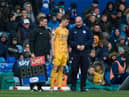 Jensen Weir preparing to come on for Latics at Birmingham last season
