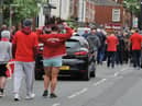 Mourners wore red to say goodbye