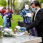 Those in key worker roles were remembered in solemn silence on Tuesday