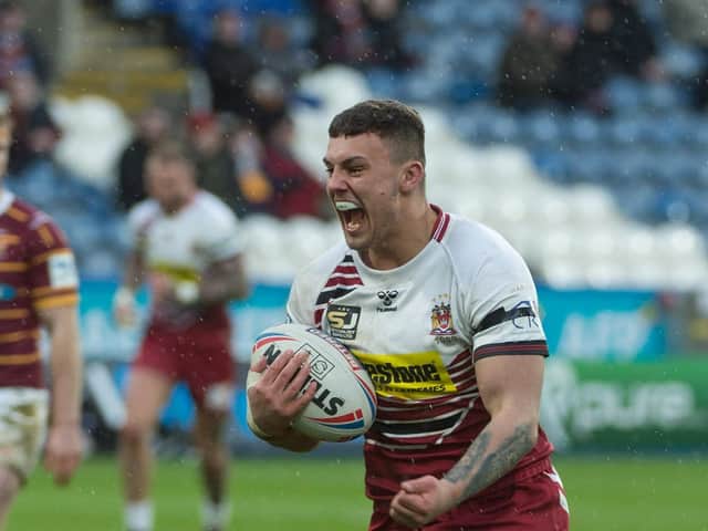 Ollie Partington goes over for a try against Huddersfield