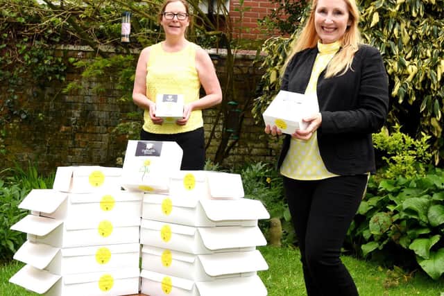 Maureen Holcroft and Andrea Hopper, from Daffodils Dreams, with the cakes