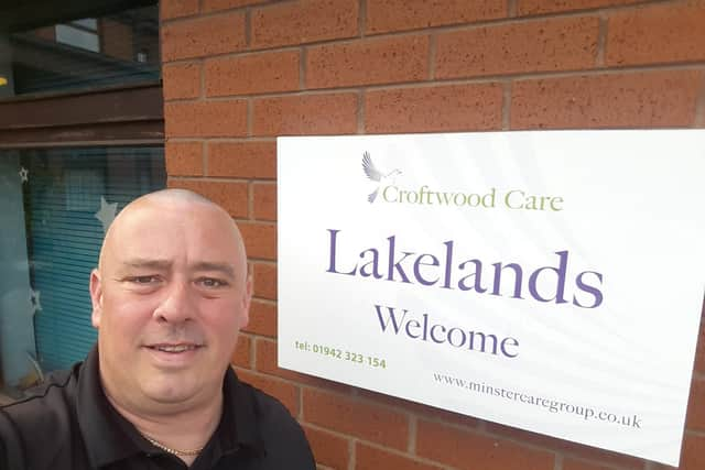 Neil Urquhart outside the care home after his fund-raising shave