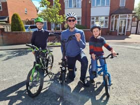 Chris Wood with his sons Tom and James
