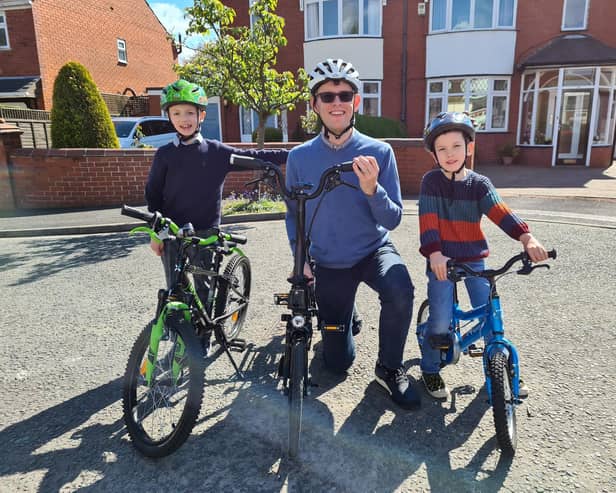 Chris Wood with his sons Tom and James