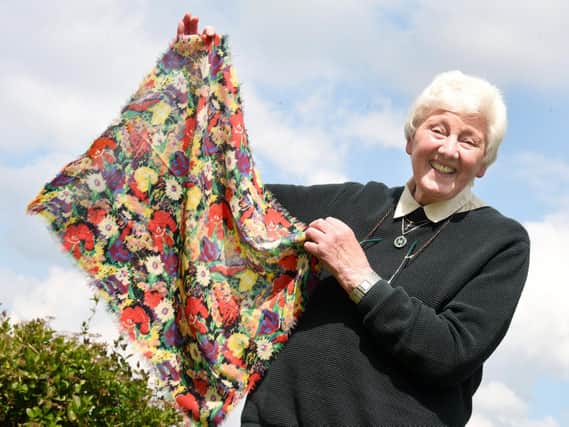 Eileen Hawkins with the scarf bought for her on VE Day