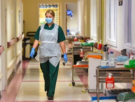 A nurse in PPE on the front line