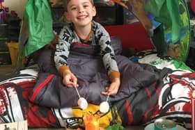 The home campers had to build a real or virtual fire