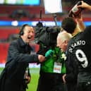 Dave Whelan takes a champagne shower!