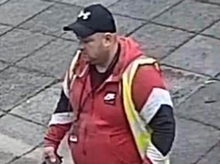 Person 2 - 12:59pm  man walking in the area of Belfield - white male, large build, beard, wearing a dark coloured Under Armour baseball cap, orange hoodie, yellow reflective tabard. Dark-coloured sweat pants with dark coloured trainers with three white stripes on. Believed to be a delivery driver.