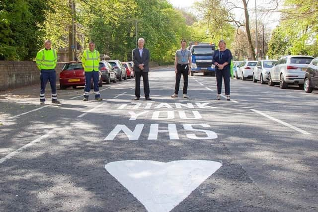 Coun David Molyneux, Alison McKenzie-Folan and Becca Heron thank NHS staff