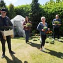 Service users and staff in the garden area