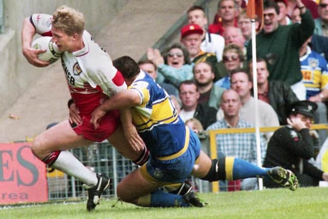 Denis Betts goes over for a try